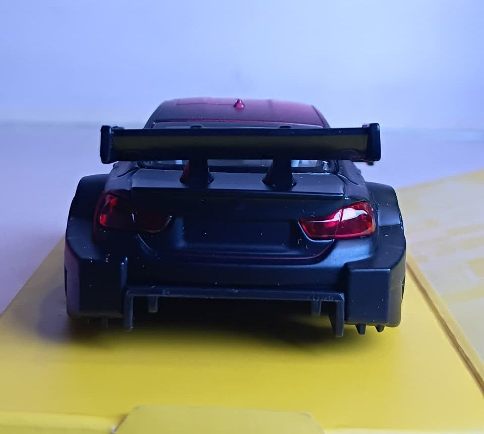 CCA BMW M4 DTM 1/36 SCALE PINK & BLACK 12024 DIECAST MODEL